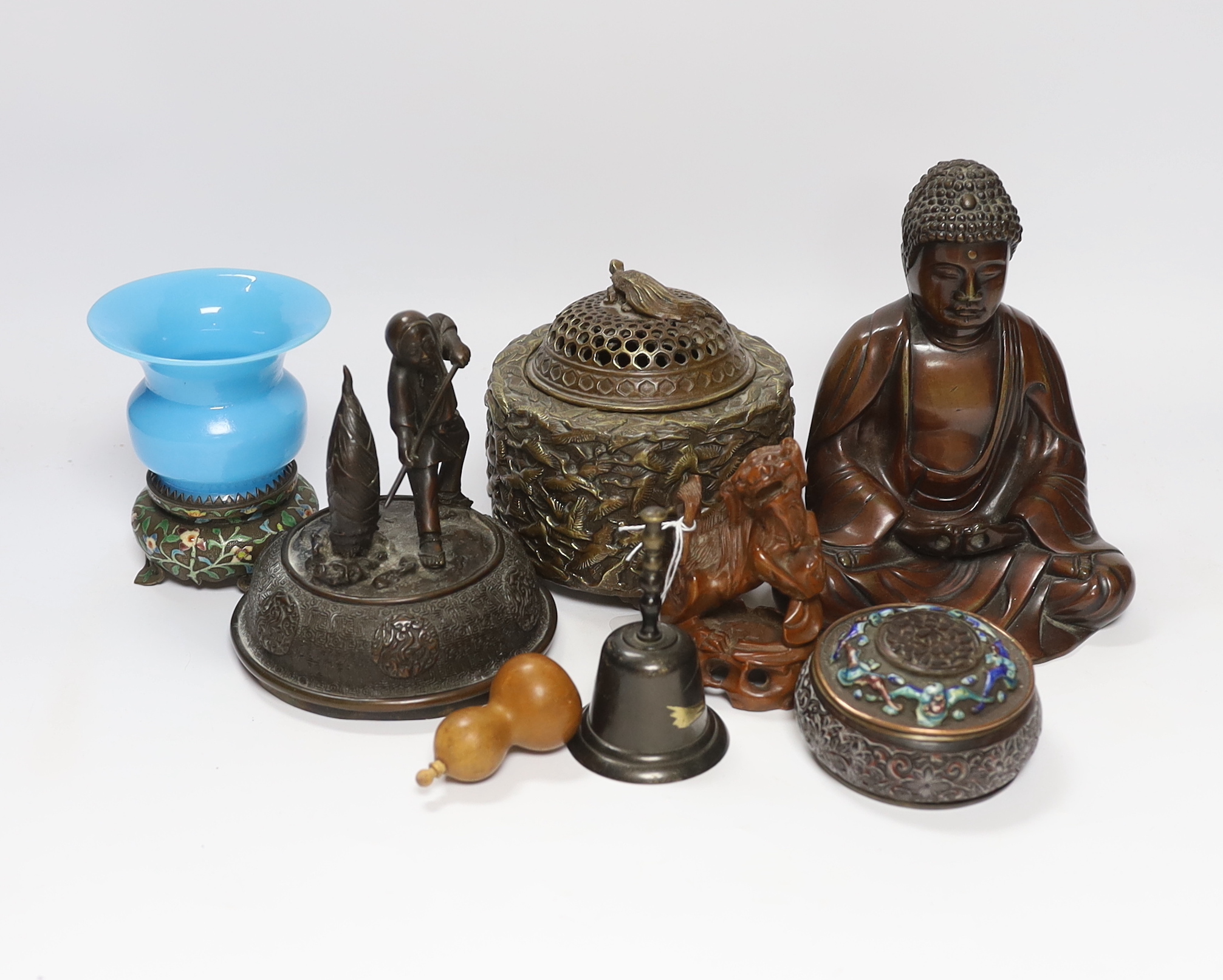 A quantity of Chinese bronzes and wood carvings including stands, seated Buddha etc.